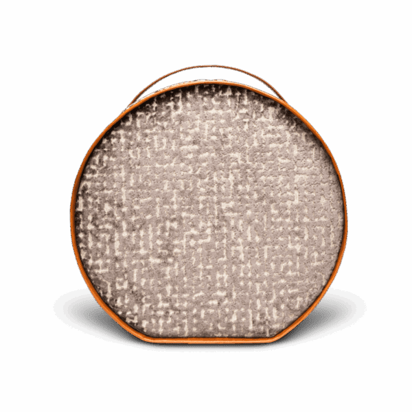 Round textured beige case with orange handle