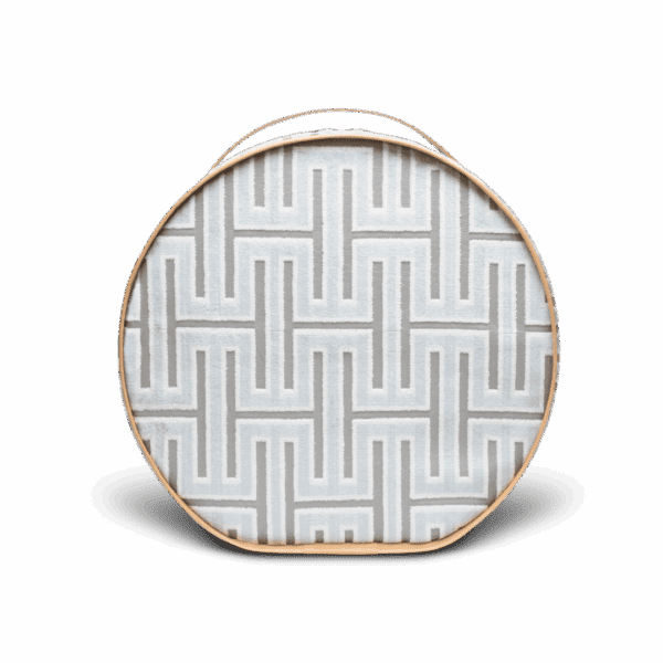 Round embroidery hoop with gray geometric fabric